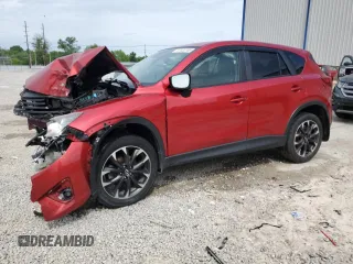 2016 Mazda CX-5 Grand Touring z VIN JM3KE4DY7G0809854, wystawiony jako Copart lot #57433765 z przebiegiem Nie podano mil oraz Nie do naprawy • Non repairable. Historia ofert i sprzedaży dostępna na DreamBid. Obrazek 1.