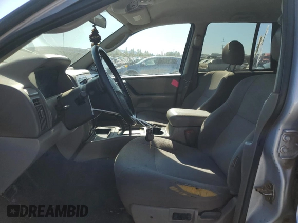 2004 Jeep Grand Cherokee Laredo with VIN 1J4GW48S54C103651, listed as a Copart auction lot 62972615 with 188,000 mi miles and Clean title. Bid and sale history available at DreamBid. Image 7.