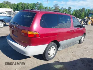 1998 Toyota Sienna LE with VIN 4T3ZF13CXWU003140, listed as a IAAI auction lot 42218556 with 230,679 mi miles and . Bid and sale history available at DreamBid. Image 4.