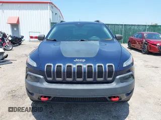 2015 Jeep Cherokee Trailhawk with VIN 1C4PJMBS3FW704622, listed as a IAAI auction lot 42465702 with 96,831 mi miles and . Bid and sale history available at DreamBid. Image 12.