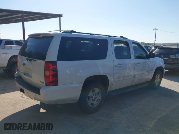 2011 Chevrolet Suburban LT with VIN 1GNSCJE06BR309881, listed as a IAAI auction lot 42577452 with 254,073 mi miles and . Bid and sale history available at DreamBid. Image 13.