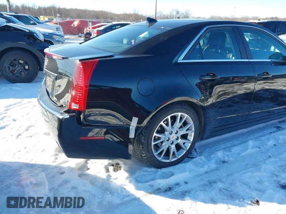 2013 Cadillac CTS Premium z VIN 1G6DS5E34D0160676, wystawiony jako IAAI lot #41262795 z przebiegiem 122 248 mil mil oraz . Historia ofert i sprzedaży dostępna na DreamBid. Obrazek 6.