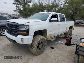 2016 Chevrolet Silverado 1500 LT with VIN 3GCUKREC9GG132988, listed as a Copart auction lot 44128575 with 124,764 mi miles and Salvage Title. Bid and sale history available at DreamBid. Image 1.