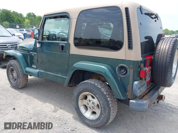 1999 Jeep Wrangler Sahara z VIN 1J4FY49S7XP442719, wystawiony jako IAAI lot #42506510 z przebiegiem 188 175 mil mil oraz . Historia ofert i sprzedaży dostępna na DreamBid. Obrazek 3.