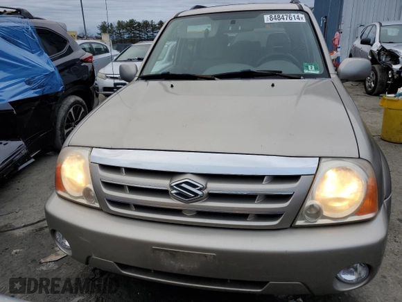 2004 Suzuki XL7 LX z VIN JS3TX92V744100442, wystawiony jako Copart lot #84847614 z przebiegiem 82 751 mil mil oraz Szkody całkowita. Historia ofert i sprzedaży dostępna na DreamBid. Obrazek 5.