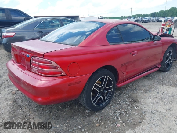 1994 Ford Mustang with VIN 1FALP4047RF117240, listed as a IAAI auction lot 42315542 with 120,825 mi miles and . Bid and sale history available at DreamBid. Image 4.
