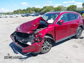 2018 Mazda CX-5 Grand Touring with VIN JM3KFADM0J0377091, listed as a IAAI auction lot 41677544 with 91,758 mi miles. Bid and sale history available at carsss.com. Image 18.