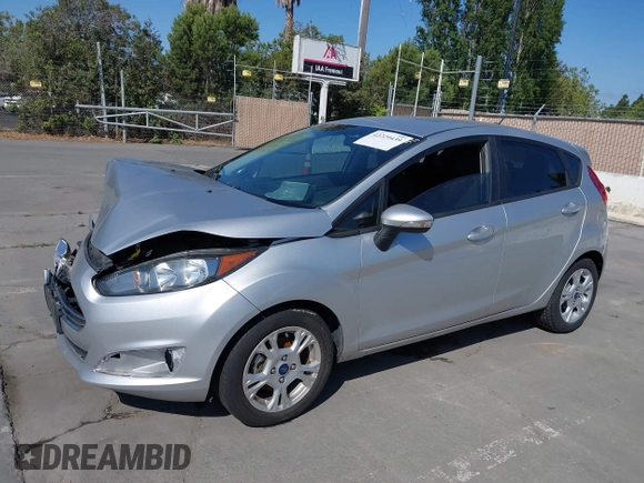 2014 Ford Fiesta SE with VIN 3FADP4EJ8EM121567, listed as a IAAI auction lot 42229439 with 108,640 mi miles and . Bid and sale history available at DreamBid. Image 2.