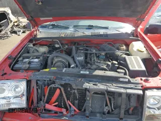 1996 Jeep Grand Cherokee Laredo with VIN 1J4GZ58S0TC170623, listed as a Copart auction lot 68019014 with 174,192 mi miles and Salvage Title. Bid and sale history available at carsss.com. Image 12.