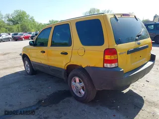 2003 Ford Escape XLS Popular with VIN 1FMYU92113KD90189, listed as a IAAI auction lot 42082279 with 261,215 mi miles. Bid and sale history available at carsss.com. Image 3.