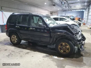 2004 Jeep Liberty Limited with VIN 1J4GL58K84W177787, listed as a Copart auction lot 88910535 with 143,779 mi miles and Salvage Title. Bid and sale history available at carsss.com. Image 4.