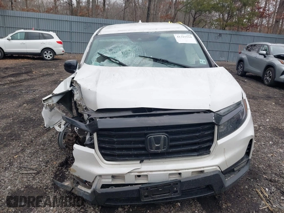 2021 Honda Ridgeline Sport with VIN 5FPYK3F1XMB011441, listed as a IAAI auction lot 41315524 with 59,840 mi miles and . Bid and sale history available at DreamBid. Image 12.