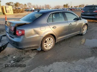 2009 Volkswagen Jetta z VIN 3VWAL71K09M133238, wystawiony jako Copart lot #81069654 z przebiegiem 153 617 mil mil oraz Szkoda całkowita • Salvage title. Historia ofert i sprzedaży dostępna na DreamBid. Obrazek 3.