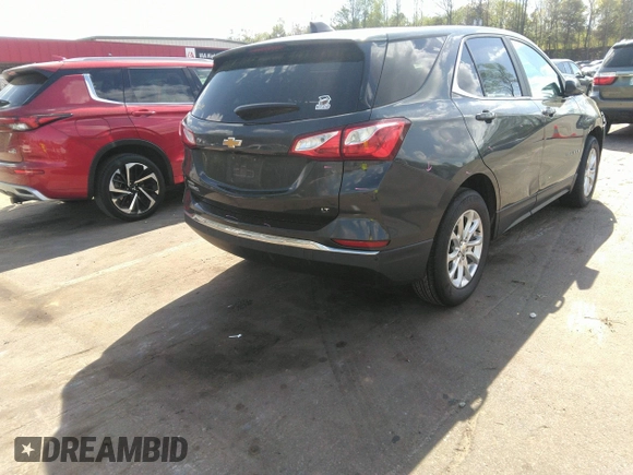2021 Chevrolet Equinox LT with VIN 3GNAXJEV3ML389503, listed as a IAAI auction lot 41973286 with 99,878 mi miles and . Bid and sale history available at DreamBid. Image 4.