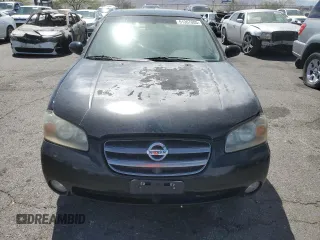 2002 Nissan Maxima GXE z VIN JN1DA31D62T404510, wystawiony jako Copart lot #51367005 z przebiegiem 185 156 mil mil oraz Czysty tytuł • Clean title. Historia ofert i sprzedaży dostępna na DreamBid. Obrazek 5.