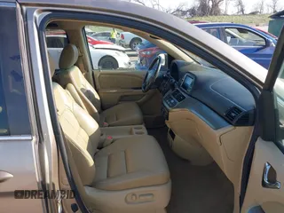 2010 Honda Odyssey EX-L with VIN 5FNRL3H79AB048049, listed as a IAAI auction lot 42055090 with 142,736 mi miles. Bid and sale history available at carsss.com. Image 5.