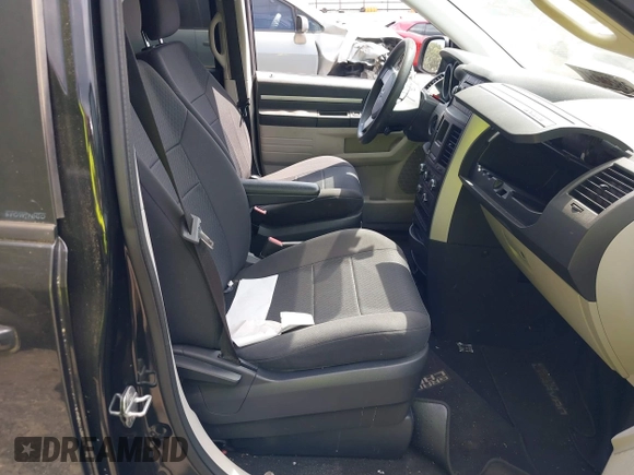 2010 Dodge Grand Caravan SE with VIN 2D4RN4DE2AR339889, listed as a IAAI auction lot 40034624 with 104,896 mi miles and . Bid and sale history available at DreamBid. Image 5.