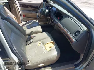 2004 Mercury Grand Marquis GS with VIN 2MEFM74W14X632470, listed as a IAAI auction lot 42120233 with 292,357 mi miles and . Bid and sale history available at DreamBid. Image 5.