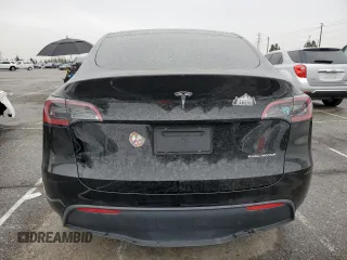 2021 Tesla Model Y Long Range with VIN 5YJYGDEEXMF294556, listed as a Copart auction lot 46668035 with 42,772 mi miles and Salvage Title. Bid and sale history available at DreamBid. Image 6.