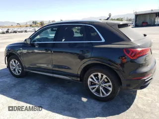 2021 Audi Q3 S line Premium with VIN WA1DECF39M1042148, listed as a Copart auction lot 59171333 with 13,894 mi miles and Salvage title. Bid and sale history available at DreamBid. Image 2.