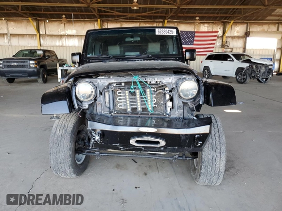 2008 Jeep Wrangler Unlimited Sahara with VIN 1J4GA59108L521910, listed as a Copart auction lot 62330425 with 169,887 mi miles and Salvage title. Bid and sale history available at DreamBid. Image 5.