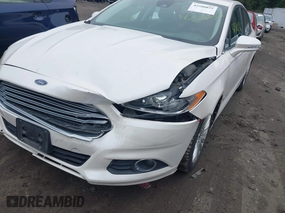 2013 Ford Fusion SE Hybrid with VIN 3FA6P0LU0DR128688, listed as a IAAI auction lot 42580852 with 137,421 mi miles and . Bid and sale history available at DreamBid. Image 12.