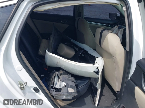 2018 Honda Civic LX with VIN 2HGFC2F59JH576975, listed as a IAAI auction lot 42098020 with 89,791 mi miles and . Bid and sale history available at DreamBid. Image 8.