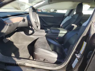 2021 Tesla Model 3 Standard Range Plus with VIN 5YJ3E1EA3MF996701, listed as a Copart auction lot 47013195 with 34,177 mi miles and Salvage Title. Bid and sale history available at carsss.com. Image 7.