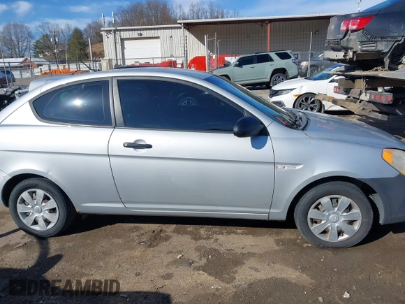 2007 Hyundai Accent GS with VIN KMHCM36C97U043769, listed as a IAAI auction lot 41526011 with 230,566 mi miles. Bid and sale history available at carsss.com. Image 13.