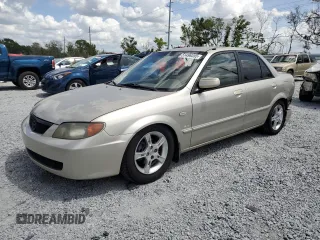 2003 Mazda Protege DX with VIN JM1BJ225X30136666, listed as a Copart auction lot 51496355 with 227,846 mi miles and Salvage Title. Bid and sale history available at DreamBid. Image 1.