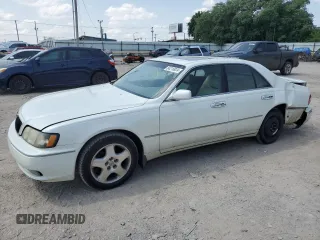 1999 Infiniti Q45 z VIN JNKBY31A2XM603477, wystawiony jako Copart lot #64216924 z przebiegiem 278 602 mil mil oraz Szkody całkowita. Historia ofert i sprzedaży dostępna na DreamBid. Obrazek 1.