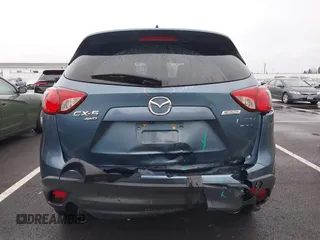 2015 Mazda CX-5 Grand Touring with VIN JM3KE4DY0F0493969, listed as a IAAI auction lot 41581885 with 71,014 mi miles. Bid and sale history available at carsss.com. Image 17.
