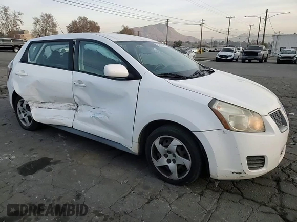 2009 Pontiac Vibe w/1SA with VIN 5Y2SL67809Z439030, listed as a Copart auction lot 87419194 with 104,518 mi miles and Salvage Title. Bid and sale history available at carsss.com. Image 11.