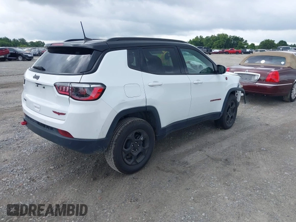 2024 Jeep Compass Trailhawk with VIN 3C4NJDDN2RT602771, listed as a IAAI auction lot 42462793 with 25,152 mi miles and . Bid and sale history available at DreamBid. Image 4.