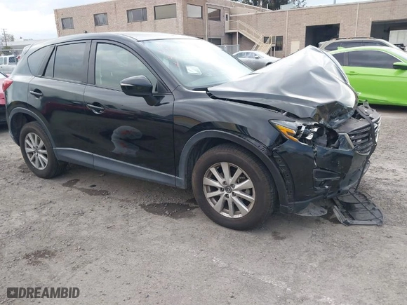 2016 Mazda CX-5 Touring with VIN JM3KE2CY7G0893101, listed as a IAAI auction lot 41783640 with NaN miles. Bid and sale history available at carsss.com. Image 1.