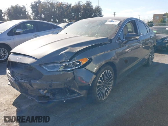 2017 Ford Fusion Titanium z VIN 3FA6P0SU5HR105477, wystawiony jako IAAI lot #41072696 z przebiegiem 92 926 mil mil oraz . Historia ofert i sprzedaży dostępna na DreamBid. Obrazek 17.