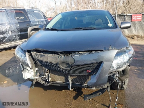 2010 Toyota Corolla with VIN 1NXBU4EE7AZ316204, listed as a IAAI auction lot 41767026 with 121,323 mi miles. Bid and sale history available at carsss.com. Image 13.