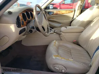 1999 Jaguar XJ with VIN SAJHD1048XC867723, listed as a Copart auction lot 76745444 with 170,999 mi miles and Salvage Title. Bid and sale history available at carsss.com. Image 7.