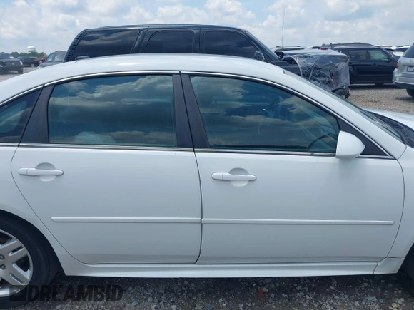 2013 Chevrolet Impala LT with VIN 2G1WG5E35D1215821, listed as a IAAI auction lot 39876555 with 152,325 mi miles and . Bid and sale history available at DreamBid. Image 13.