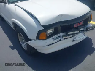 1997 GMC Sonoma with VIN 1GTCS1441VK518317, listed as a IAAI auction lot 42183464 with 75,862 mi miles. Bid and sale history available at carsss.com. Image 6.
