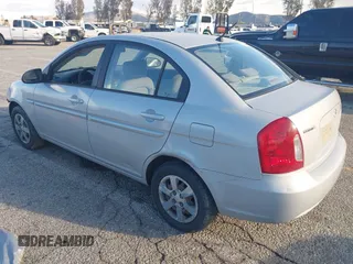 2006 Hyundai Accent GLS with VIN KMHCN46C86U007833, listed as a IAAI auction lot 41760603 with 60,030 mi miles. Bid and sale history available at carsss.com. Image 3.