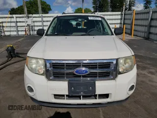 2011 Ford Escape XLS with VIN 1FMCU9C71BKC08406, listed as a Copart auction lot 61359975 with 182,954 mi miles and Salvage title. Bid and sale history available at DreamBid. Image 5.