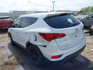 2017 Hyundai Santa Fe 2.4L z VIN 5XYZTDLB3HG439072, wystawiony jako IAAI lot #42061127 z przebiegiem 145 864 mil mil oraz . Historia ofert i sprzedaży dostępna na DreamBid. Obrazek 3.