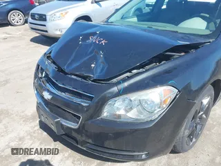 2012 Chevrolet Malibu 1LS with VIN 1G1ZB5E04CF180746, listed as a IAAI auction lot 41866051 with 140,002 mi miles and . Bid and sale history available at DreamBid. Image 6.