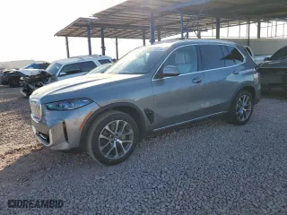 2024 BMW X5 sDrive40i with VIN 5UX13EU00R9W17716, listed as a Copart auction lot 44574655 with 7,990 mi miles and Salvage Title. Bid and sale history available at carsss.com. Image 1.