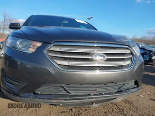 2015 Ford Taurus SEL with VIN 1FAHP2H86FG174102, listed as a IAAI auction lot 40997366 with 132,543 mi miles. Bid and sale history available at carsss.com. Image 17.