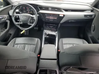 2022 Audi e-tron Premium Plus with VIN WA1LAAGE4NB014605, listed as a Copart auction lot 61127385 with 26,355 mi miles and Salvage title. Bid and sale history available at DreamBid. Image 8.