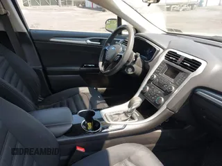 2015 Ford Fusion SE Hybrid z VIN 3FA6P0LU3FR163695, wystawiony jako IAAI lot #42428393 z przebiegiem 237 835 mil mil oraz . Historia ofert i sprzedaży dostępna na DreamBid. Obrazek 5.