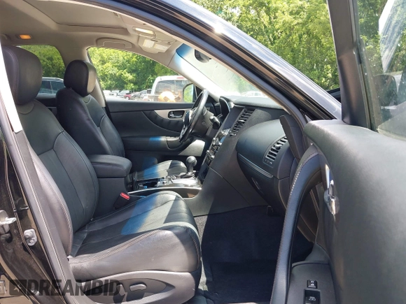2015 Infiniti QX70 with VIN JN8CS1MW1FM482625, listed as a IAAI auction lot 42332365 with 88,912 mi miles and . Bid and sale history available at DreamBid. Image 5.