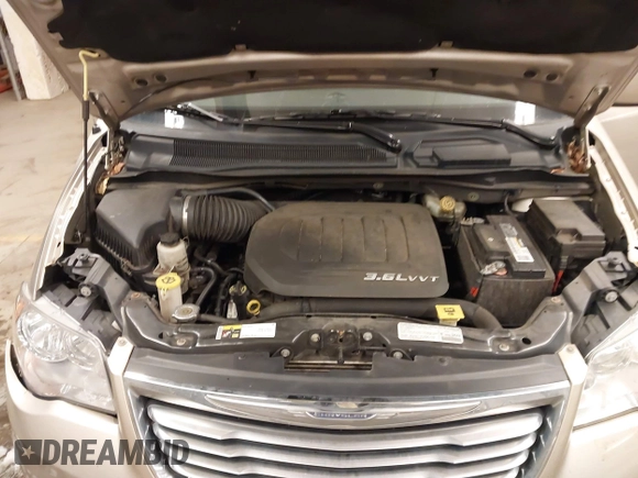 2013 Chrysler Town & Country Touring with VIN 2C4RC1BG5DR731002, listed as a IAAI auction lot 41575003 with 106,486 mi miles. Bid and sale history available at carsss.com. Image 10.